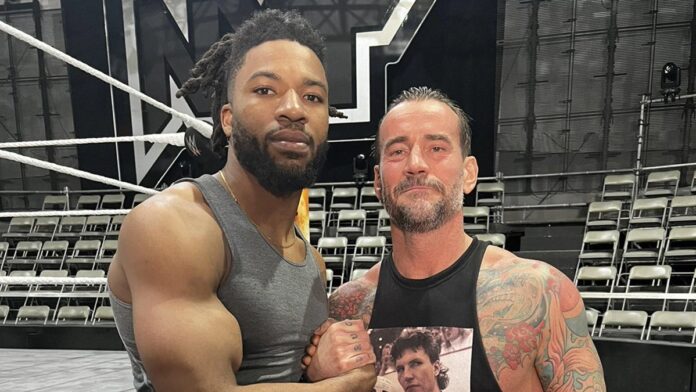 CM Punk with current NXT Champion Trick Williams