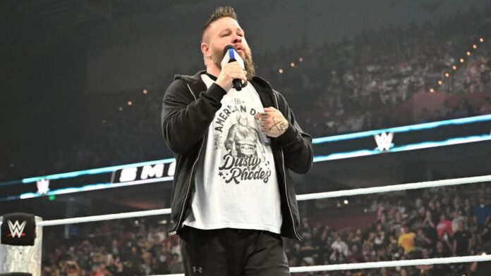 Kevin Owens interrupted SmackDown wearing a Dusty Rhodes shirt